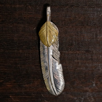 新品現行上金特大フェザー(左)