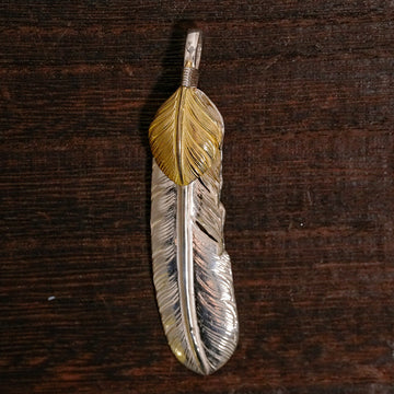 新品現行上金特大フェザー(左)