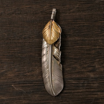 現行上金特大フェザー(左)