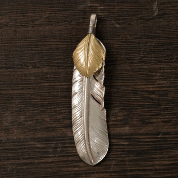 現行上金特大フェザー(左)