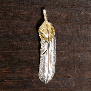 新品現行上金特大フェザー(右)